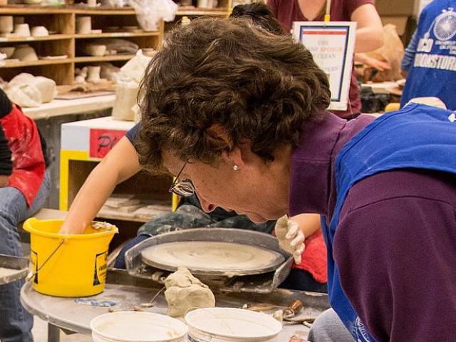 Students working on clay work at Craft Center.