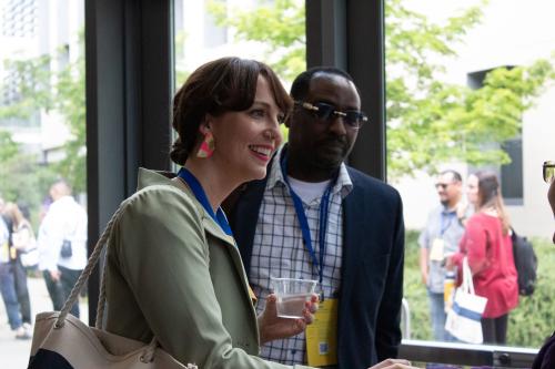 Executive Director Kayton Carter stands beside keynote speaker Kari Grain.